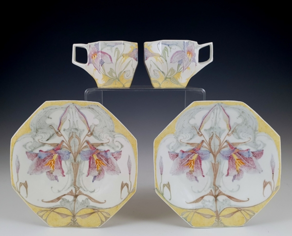 Proportio Divina | Rozenburg set of two porcelain cup and saucers by Schellink 1905